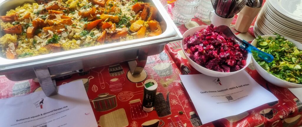 Vegetarian catering buffet at The Electric Elephant Cafe with roasted squash, rice and colourful fresh salads